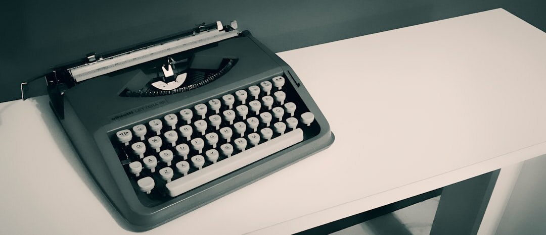 Editorial writing desk with typewriter and magazines