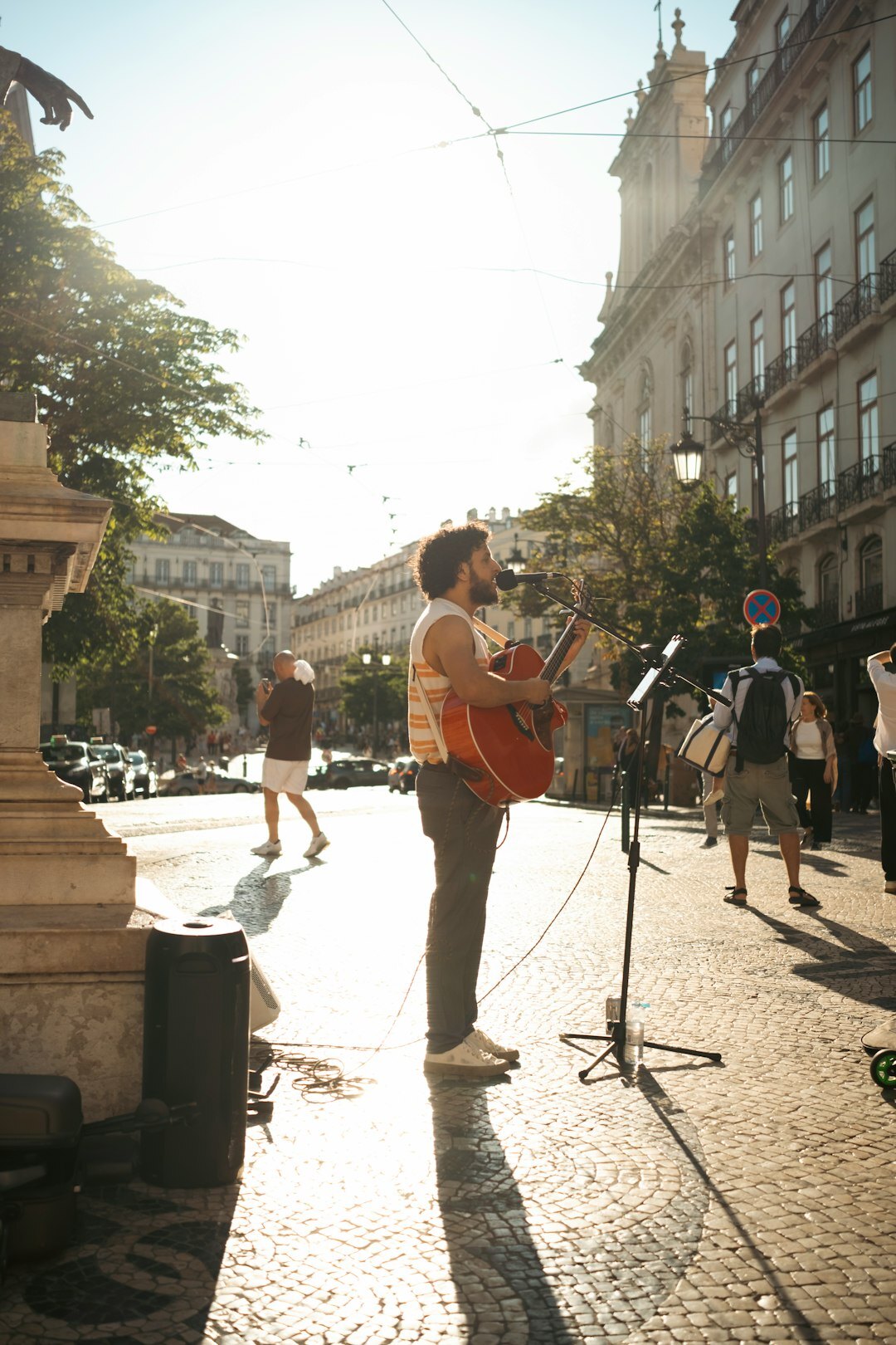 Portrait of a European male musician holding a guitar
