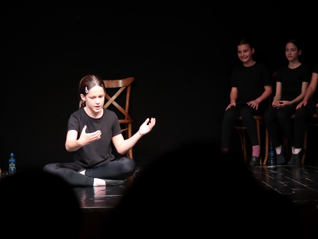 young actor auditioning on stage