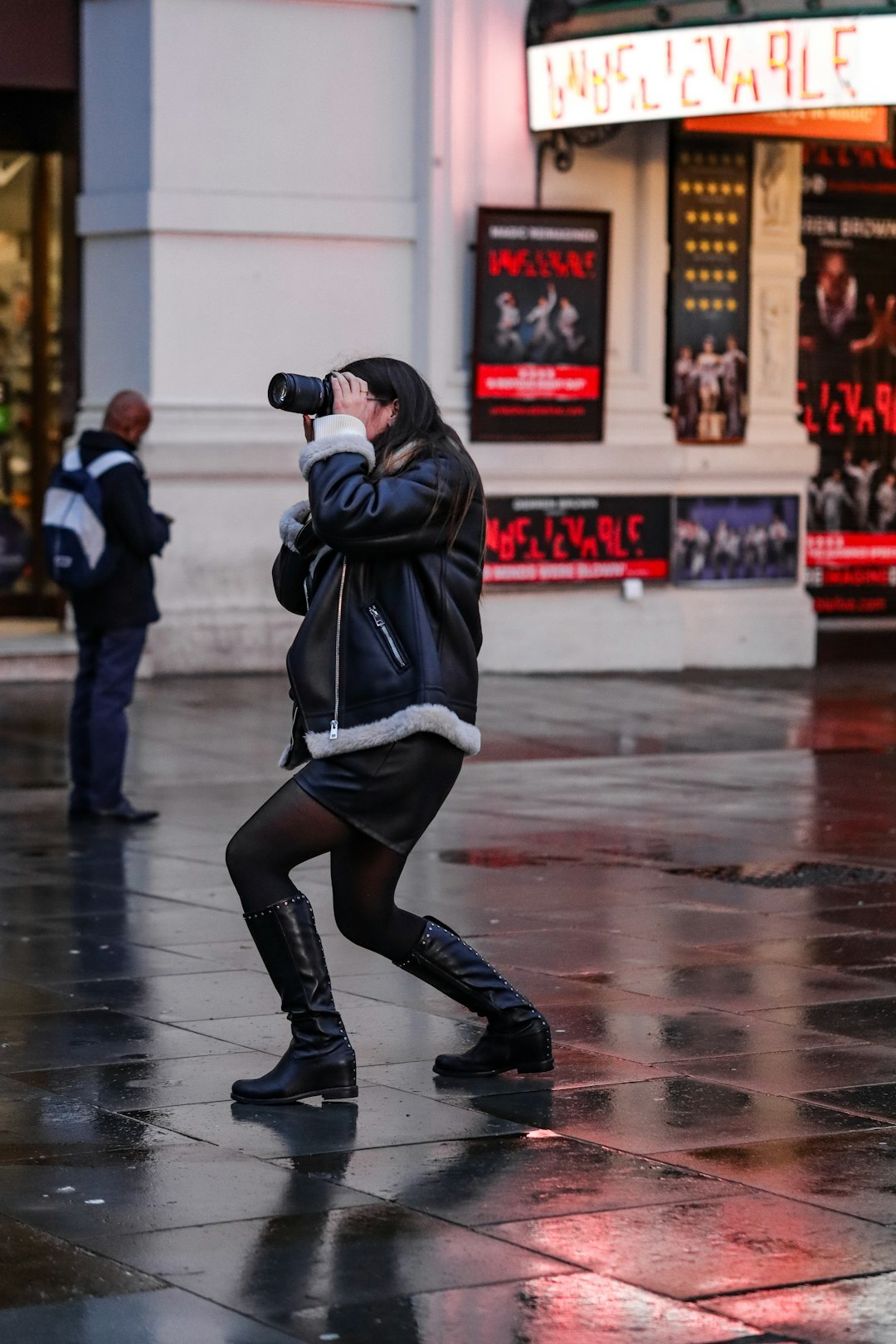 paparazzi photographers chasing celebrity